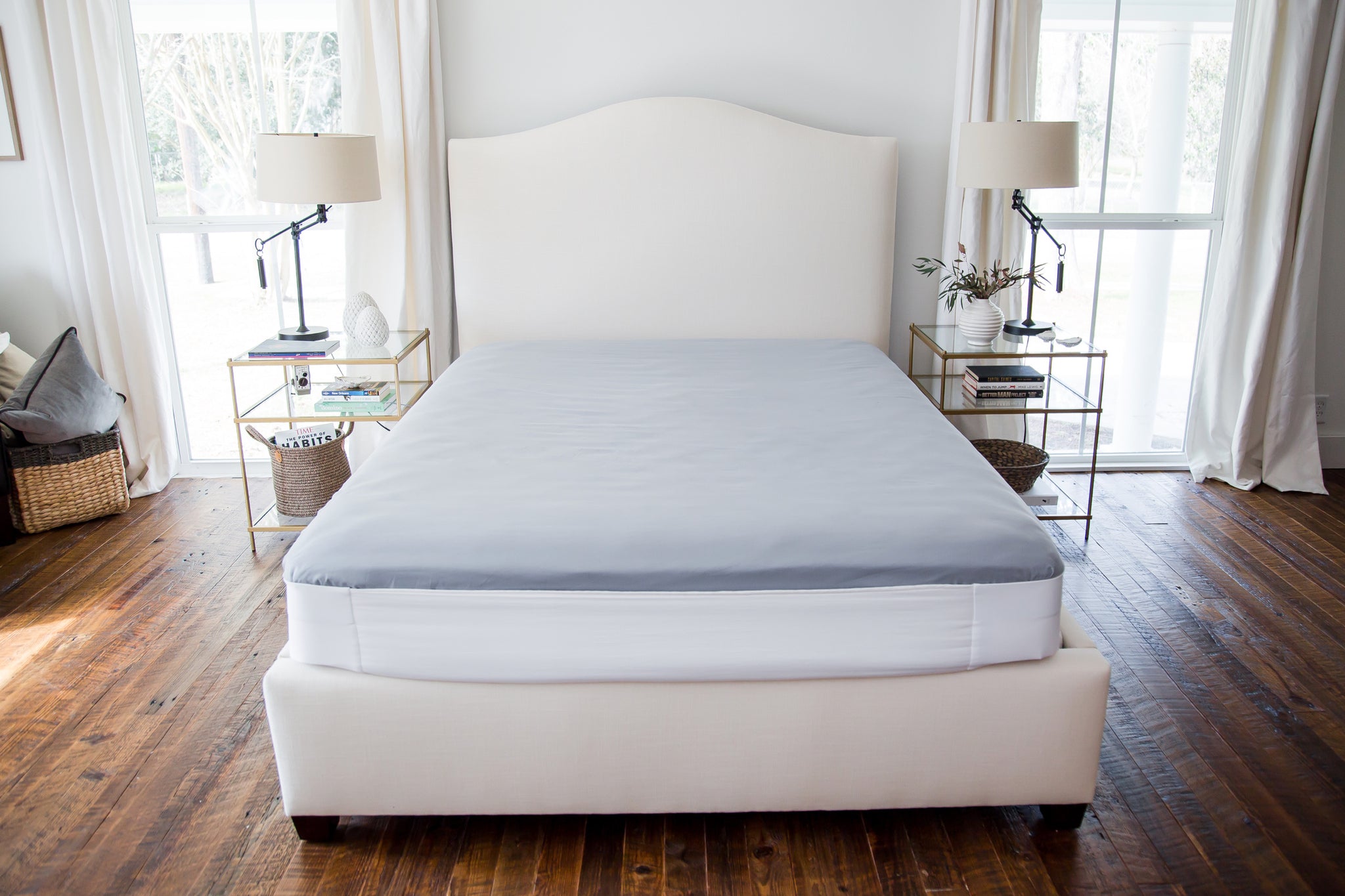 Putting the Better Bedder® on your mattress. No more tucking sheets under  your heavy mattress! 